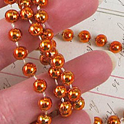 Orange Mardi Gras Beads
