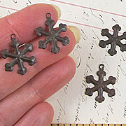 Rusty Tin Snowflakes