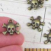 5/8 Inch Bronze Skull & Bones Charms*