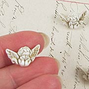 Small Ivory Cherub Buttons