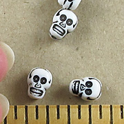 Tiny Plastic Skull Beads